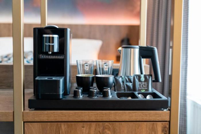 哈尔霍斯贝斯特韦斯特Plus酒店 阿纳姆 客房 照片 A Nespresso coffee machine in a hotel room